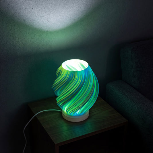 Centauri - lámpara de mesa bicolor, geometría que cobra vida