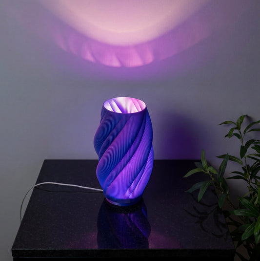 Alpha - lámpara de mesa bicolor,  geometría que hipnotiza